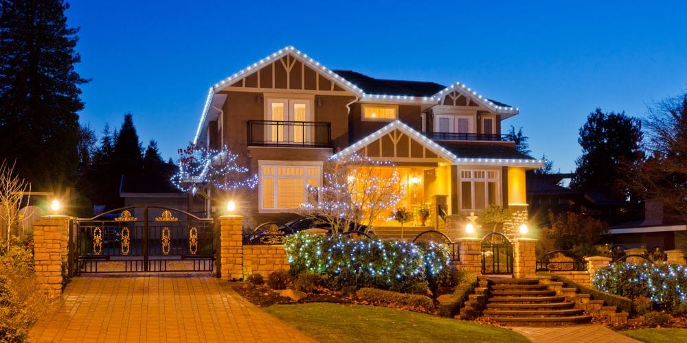 Modern luxurious home with beautiful exterior lighting.